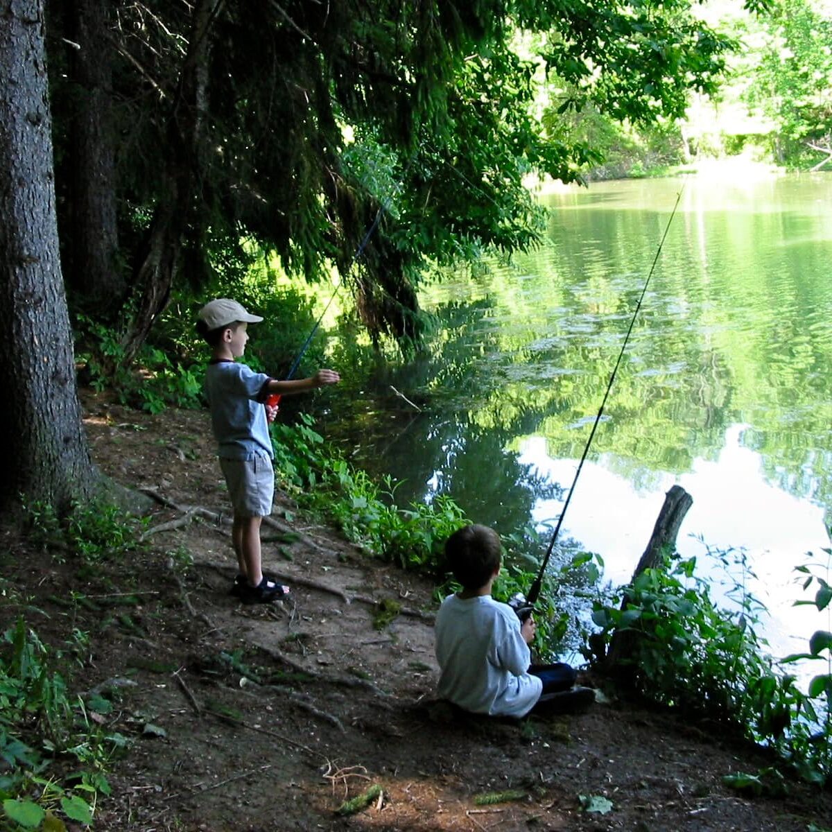 boys fishing alongside Peters Lake